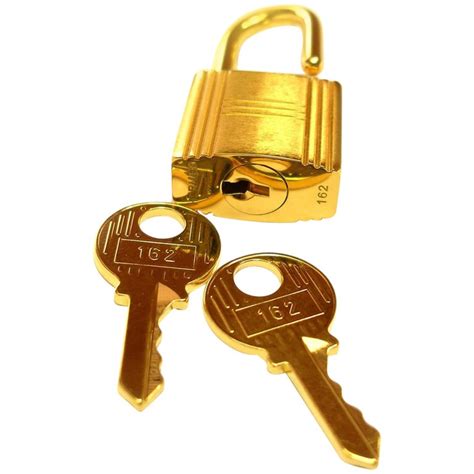 hermes gold lock|hermes handbag lock for sale.